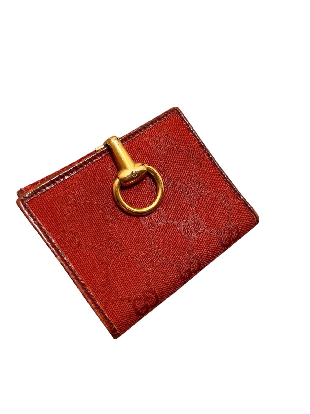 Gucci Bifold wallet with gold-toned
Horsebit hardware